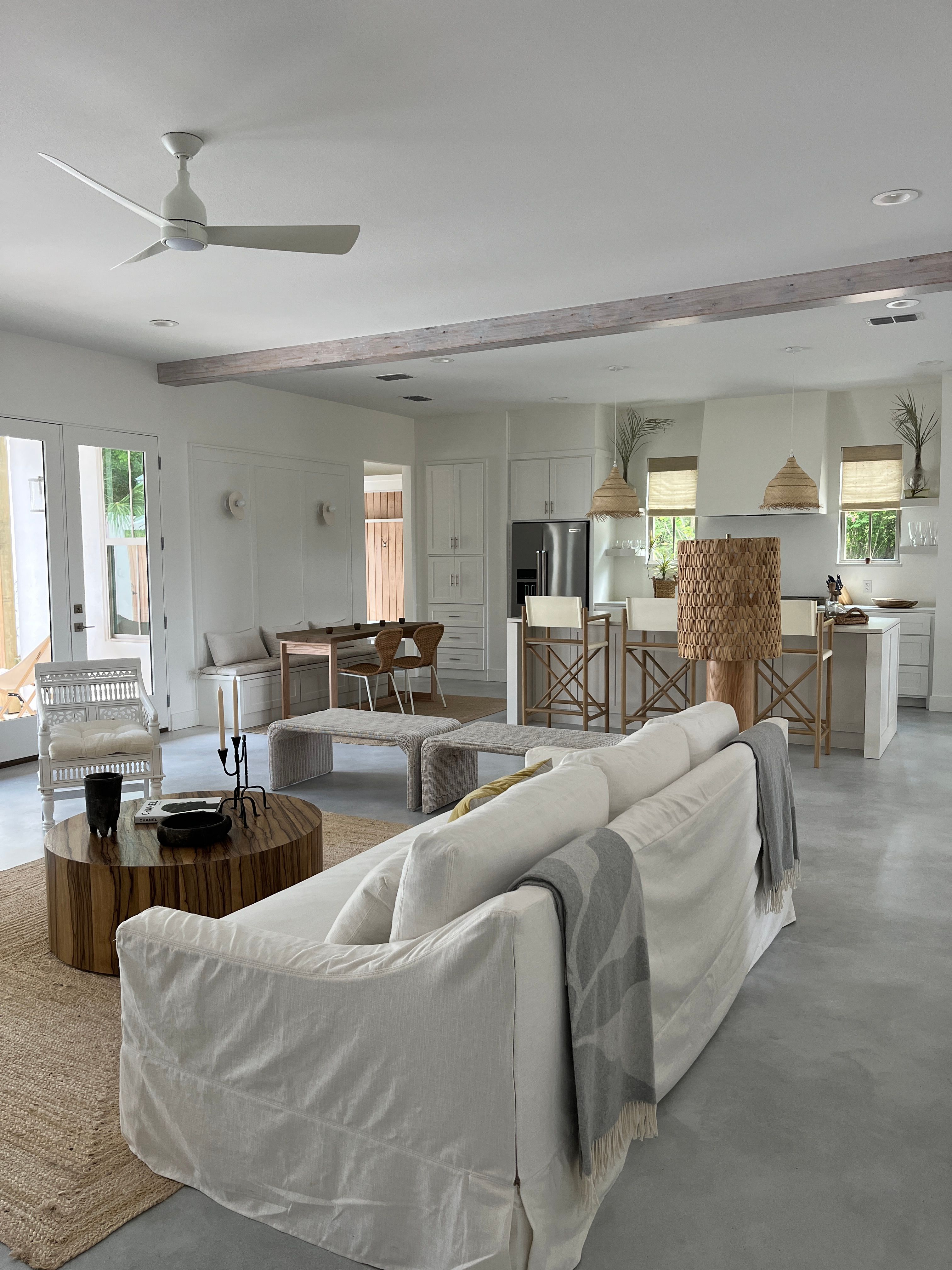 Bright, spotless open-plan kitchen and living room in a freshly cleaned Southwest Florida home